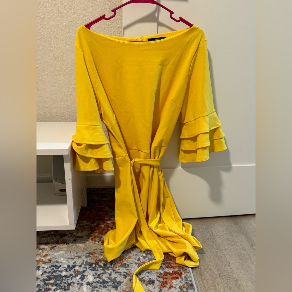 Pretty new dress worn only once but the size is big